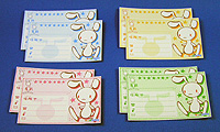 ウサギの絵があしらわれた名刺です。グリーン、イエロー、ピンク、ブルーの4色が用意されています